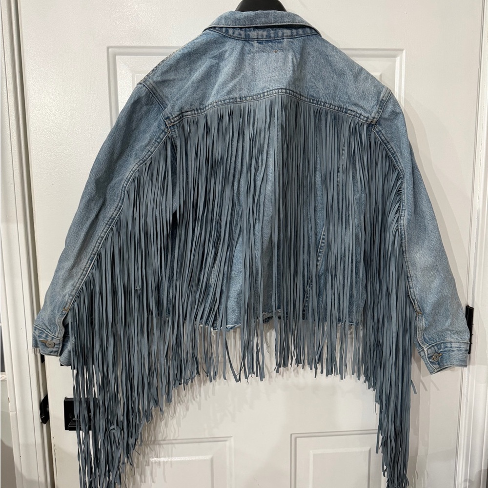 Levi’s ex boyfriend fringe trucker jacket

Worn one time! Like new